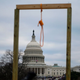 A noose is seen on makeshift gallows as supporters of US President Donald Trump gather on the West side of the U.S. Capitol in Washington, D.C., on January 6, 2021.